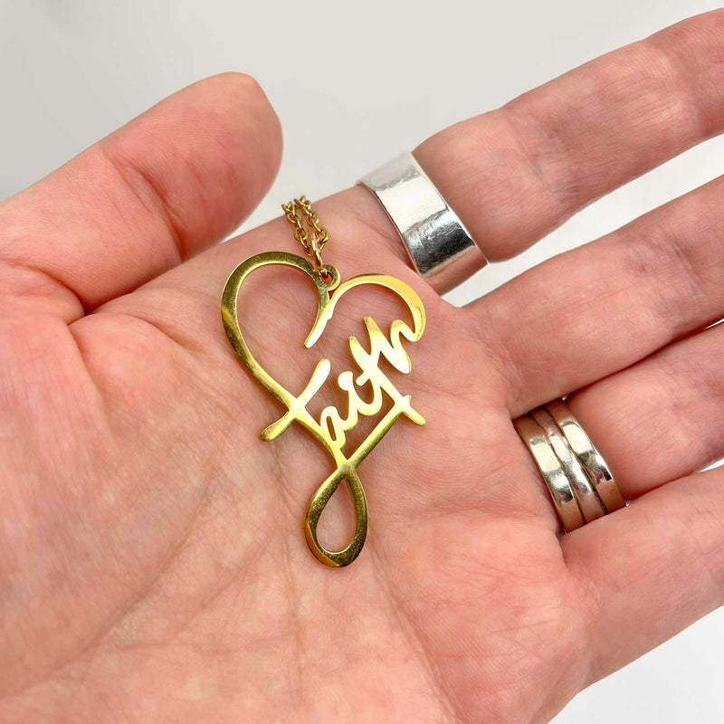 Faith Heart Necklace - 18K Gold-Plated Stainless Steel Pendant Necklace in hand