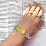 He Is Risen! Colorful Easter Silver-Plated Scripture Charm Bracelet (2 sizes)